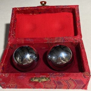 CHINESE IRON BAODING BALLS WITH MUSICAL CHIME IN RED BROCADE BOX